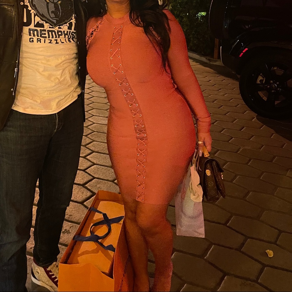 A pinkish bandage dress